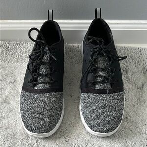 NWOT Black and Gray Men's Size 8/ women’s size 10 Under Armour sneakers.